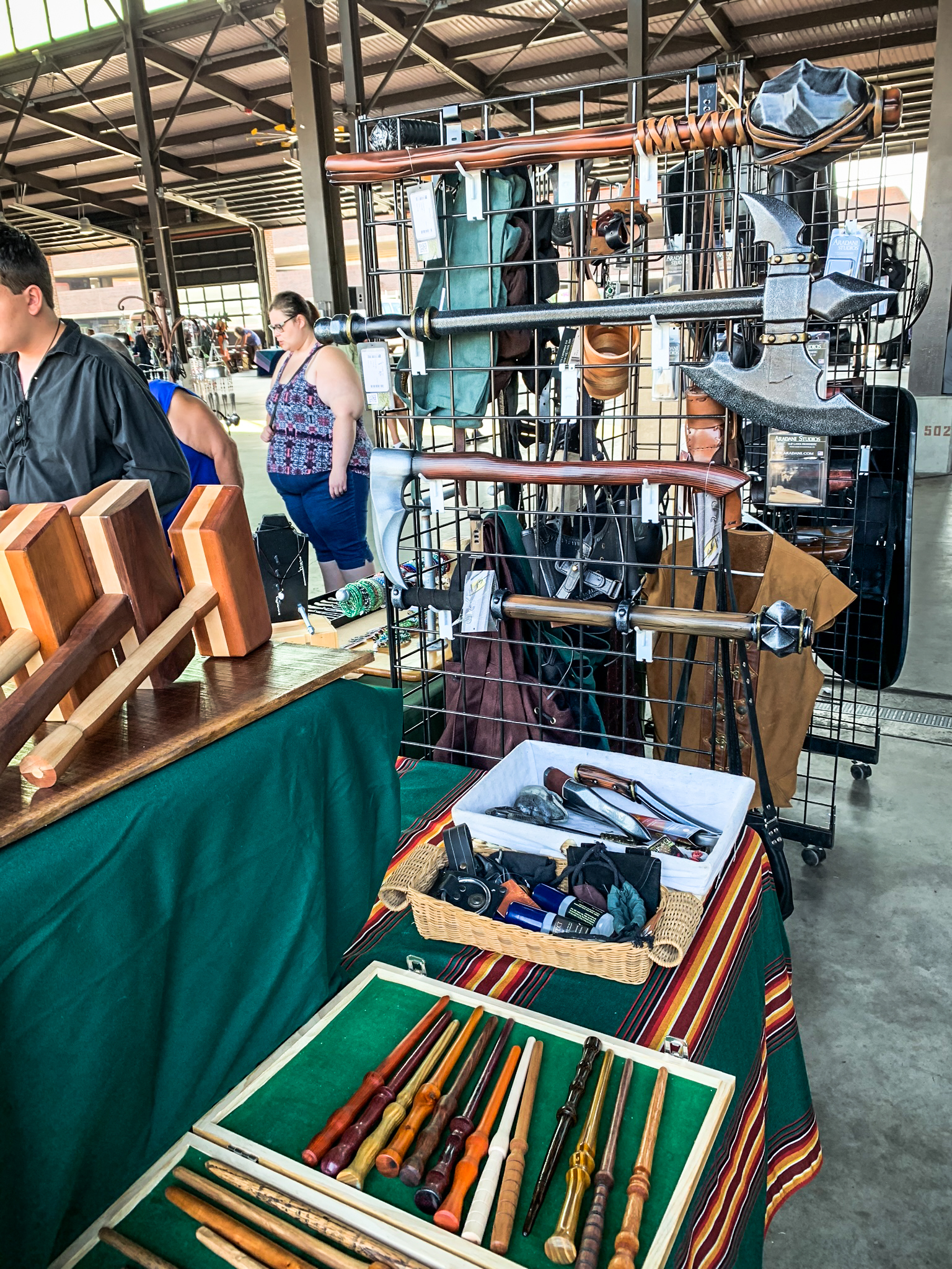 eastern market with wooden wands, epic armoury weapons, mace, axe, throwing knives, leathergoods and more