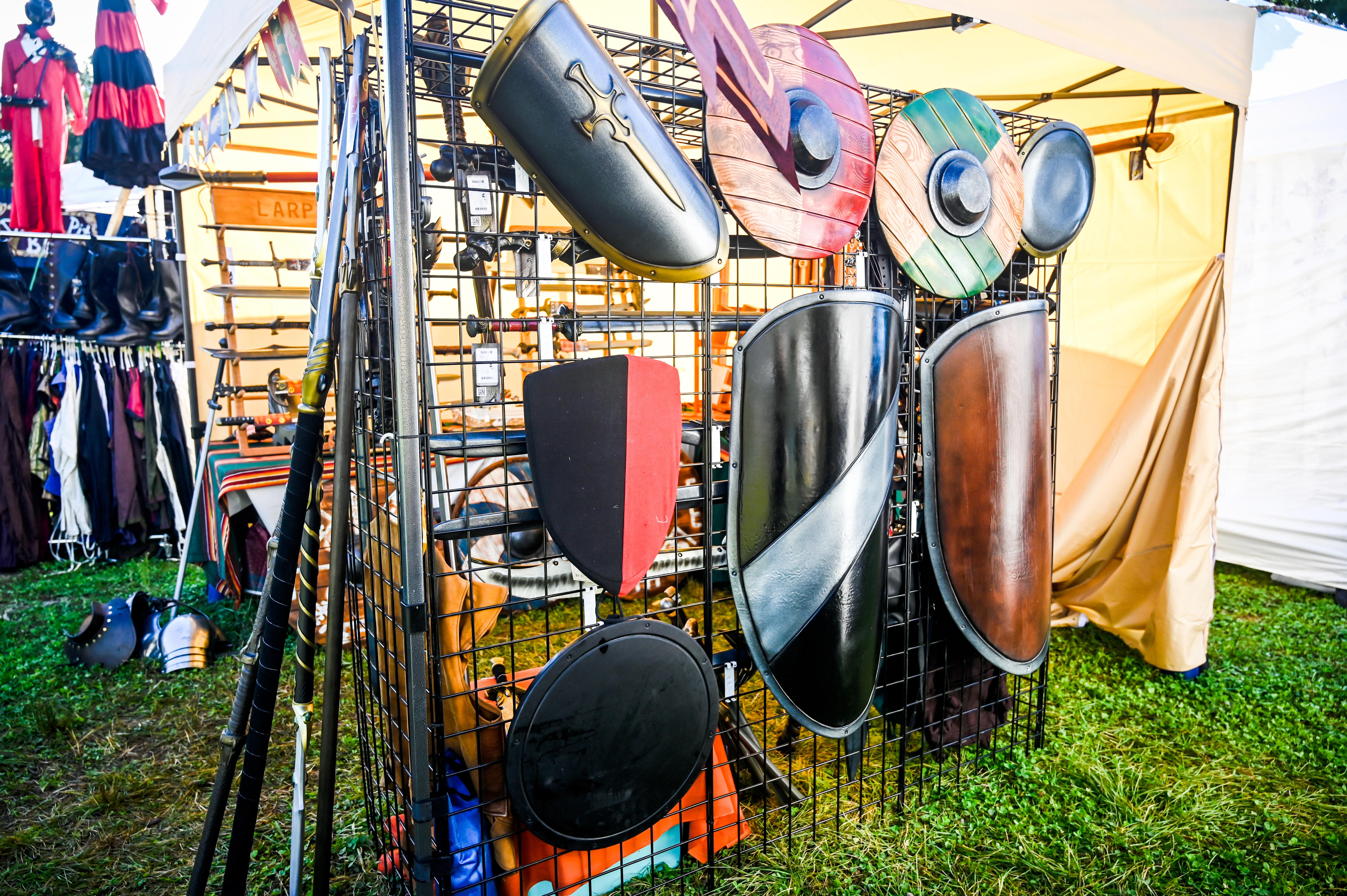 michigan renaissance festival set up with larp shields and high quality foam larp weapons